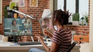 Employee attending online meeting call