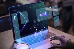 this is an image of an open laptop with hologram projections floating above it.