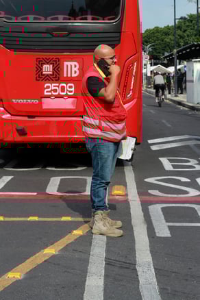 This is an image of a blue-collar worker on the phone.